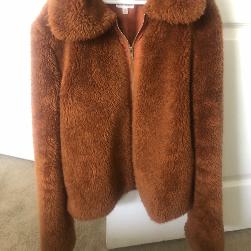 A puffy teddy bear jacket